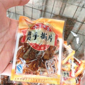 阿里巴巴批发麻辣鱿鱼片 包装休闲零食 广西海产品特产图2